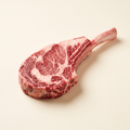 Raw tomahawk ribeye steak — Alberta grass-fed beef