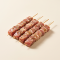 Raw marinated souvlaki skewers