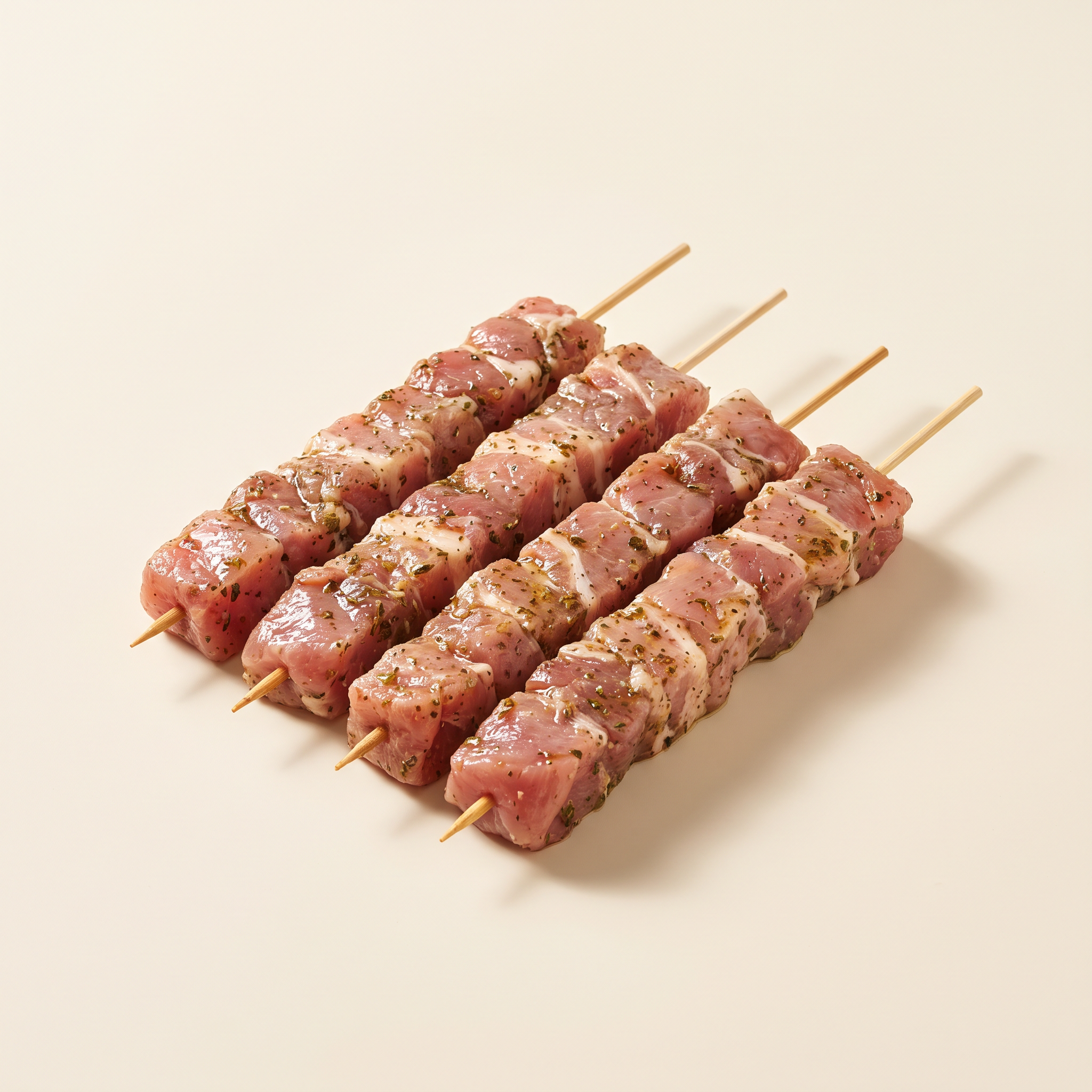 Raw marinated souvlaki skewers