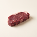 Raw bison New York strip steak