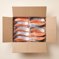 Full box — vacuum-sealed portions of wild salmon fillets