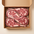 Full box — vacuum-sealed portions of tomahawk