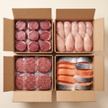 The Starter bundle — four full boxes: lean filet mignon, chicken breasts, ground beef, wild salmon